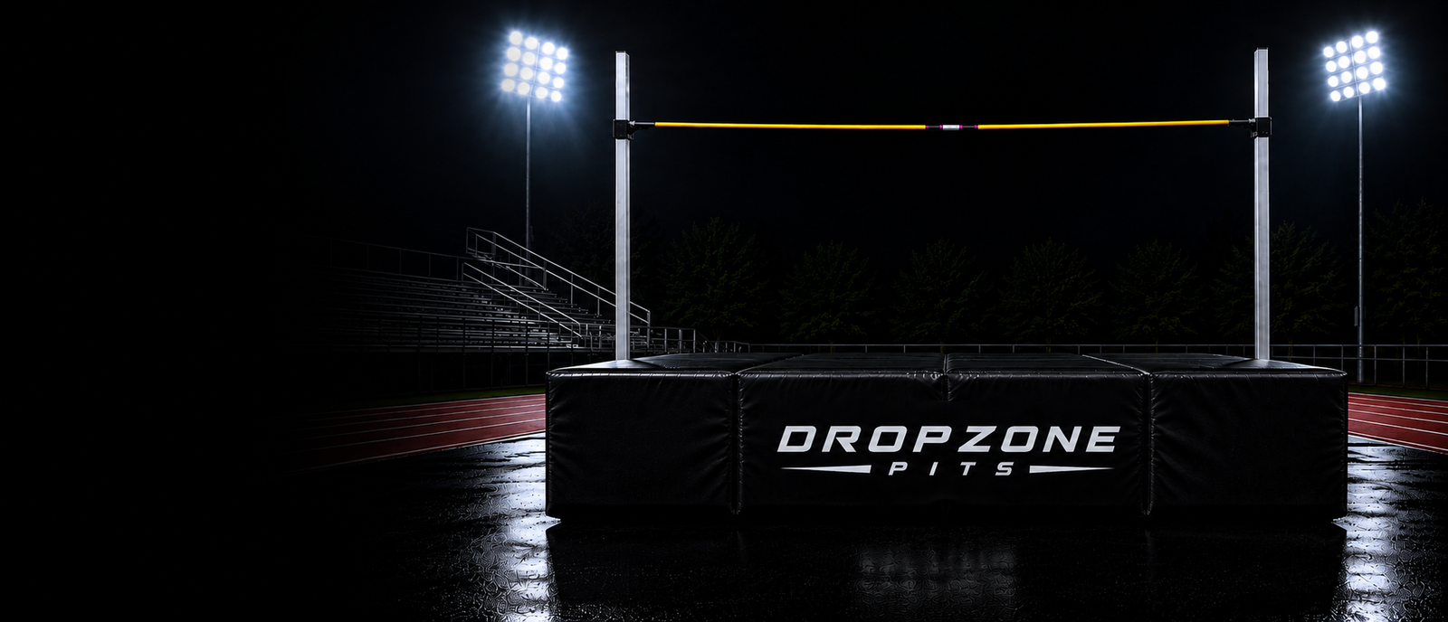 Dropzone Pits high jump pit under stadium lights